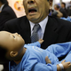 Illustration for article titled Robot Baby Cries; Actual Man Freaks Out
